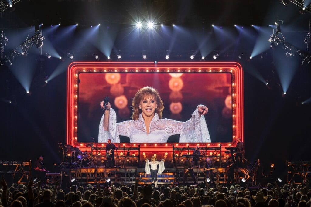 Reba Reba performing a music concert