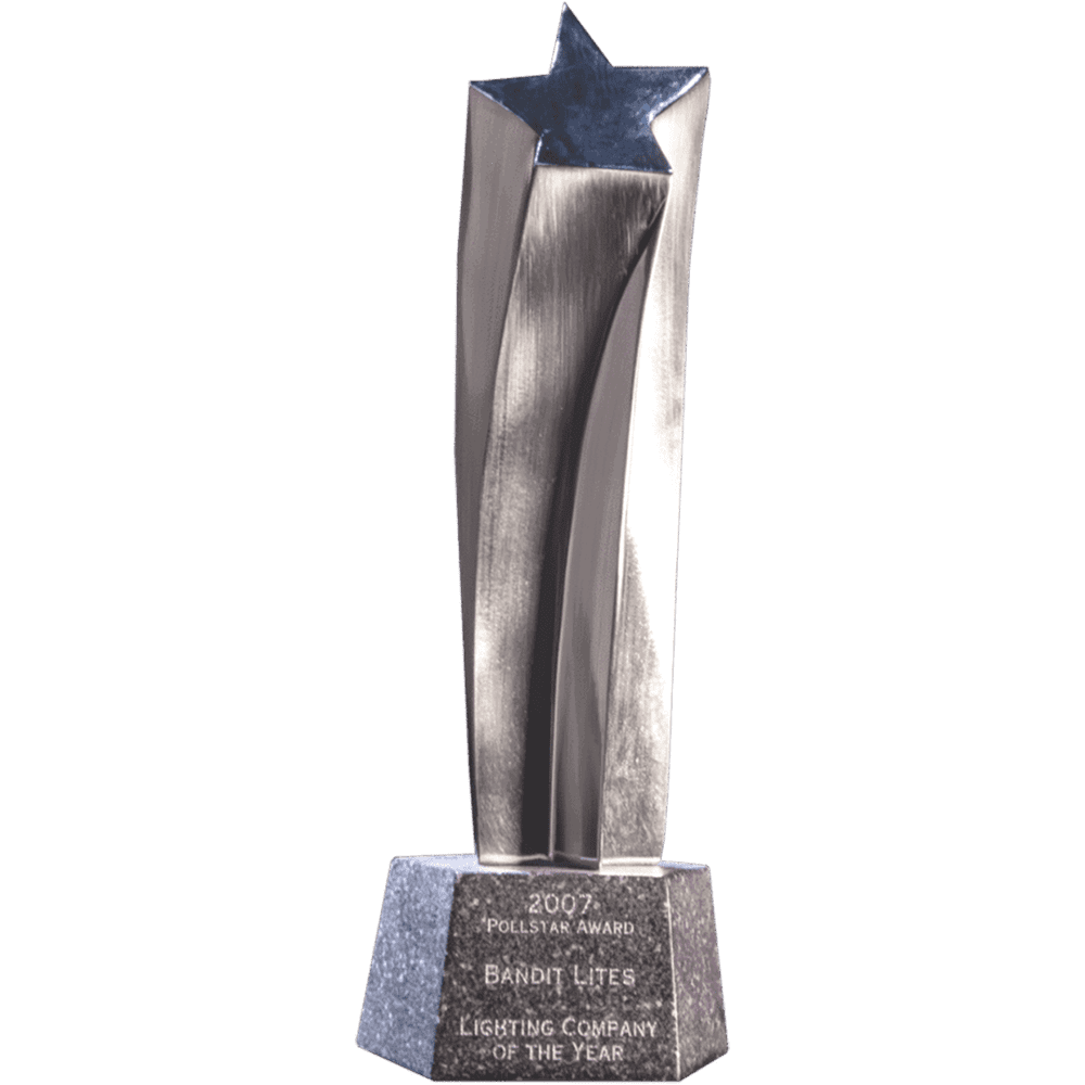 Tall silver trophy with a star on top and engraved base.
