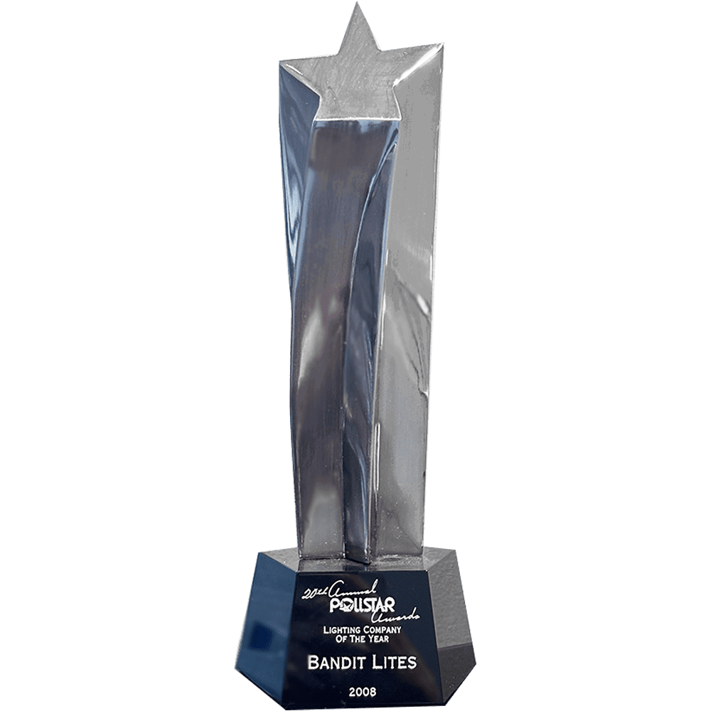 A tall, silver trophy with a star on top.